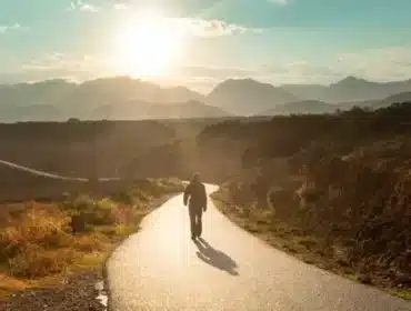 Image of a Christian man walking down a path on a journey