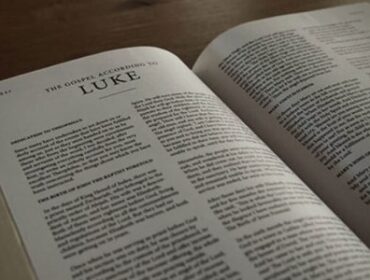 Image of the Bible opened to the book of Luke
