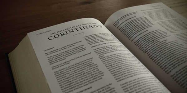 Image of the Bible opened to the book of 1 Corinthians