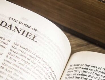 Image of the Bible open to the book of Daniel