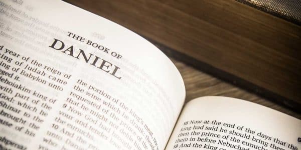 Image of the Bible open to the book of Daniel