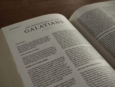 Image of the bible opened to the book Galatians
