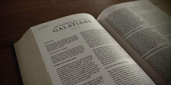 Image of the bible opened to the book Galatians