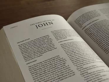 Bible opened to the book of 1 John