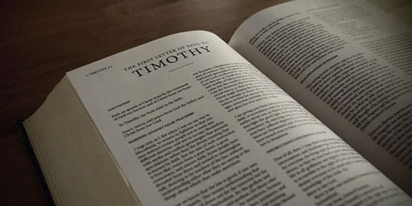 Image of the Bible opened to the book 1 Timothy