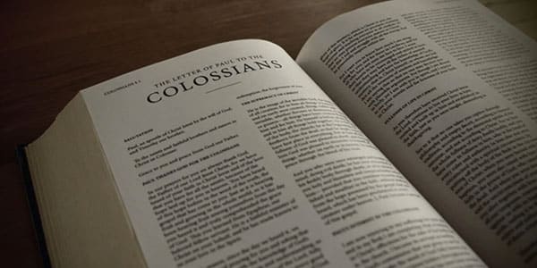 Image of the Bible opened to the book Colossians