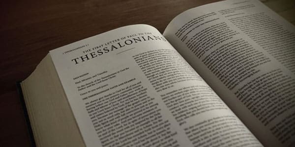 Image of the Bible opened to the book Thessalonians